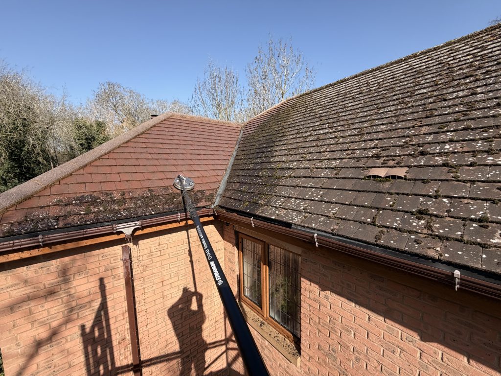 Roof cleaning in progress on a property in Northampton