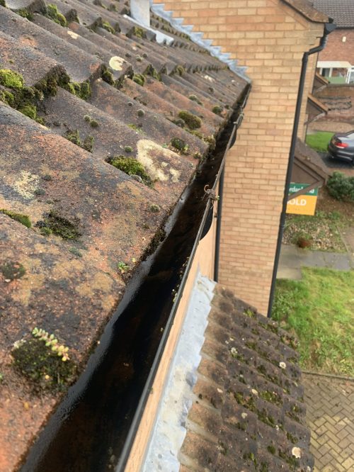 overflowing gutters after cleaning