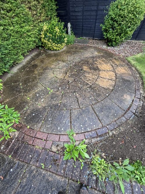 patio before professional cleaning in Rushden
