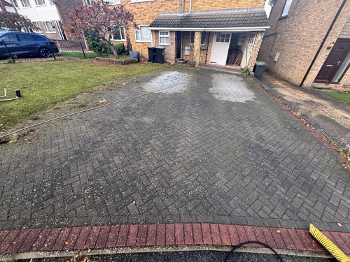 dirty driveway before professional pressure washing