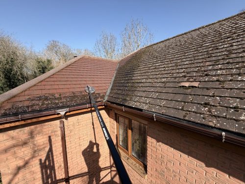 Roof cleaning in progress on a property in Northampton